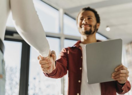 close-up-business-people-hand-shake-min